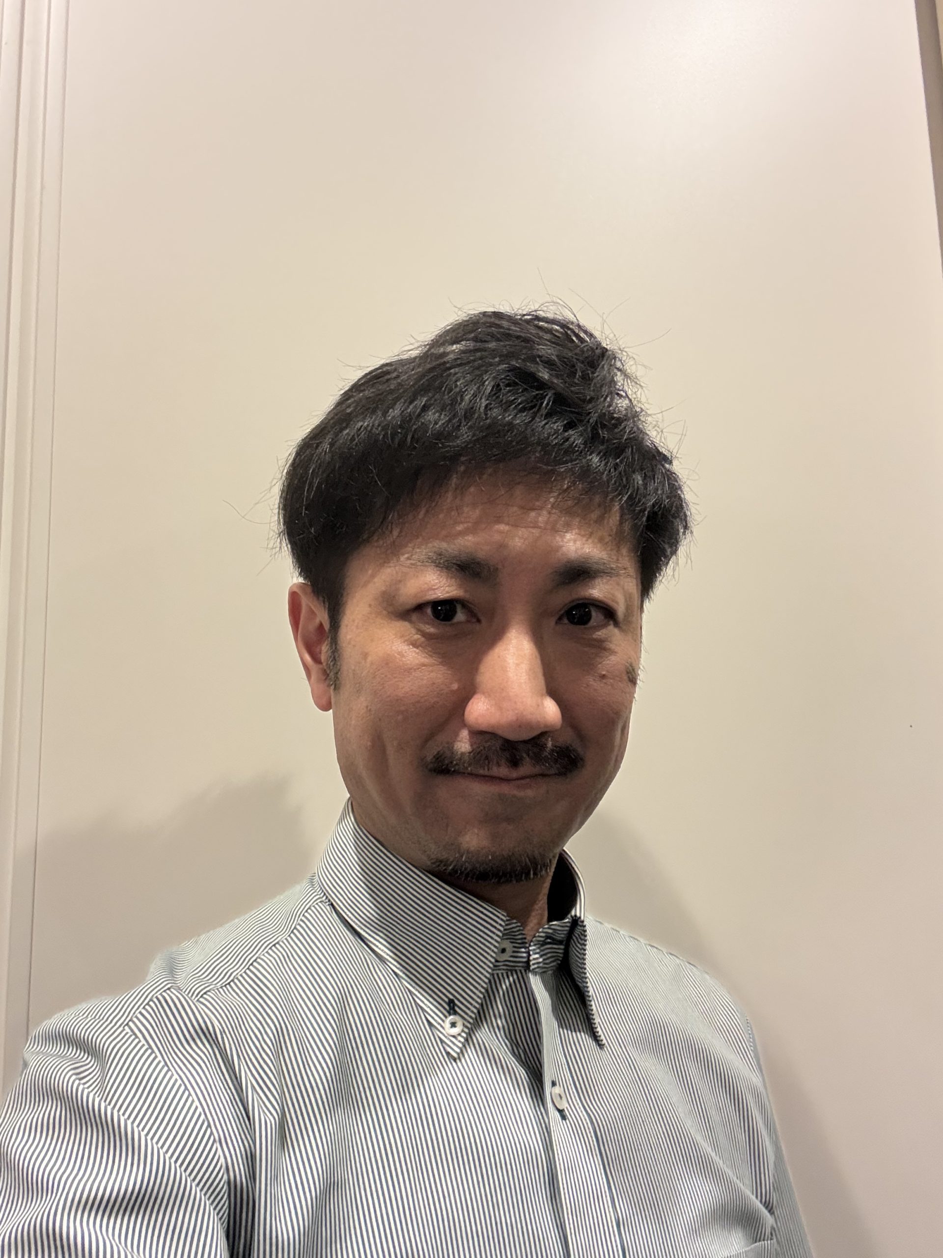 新谷 卓也
